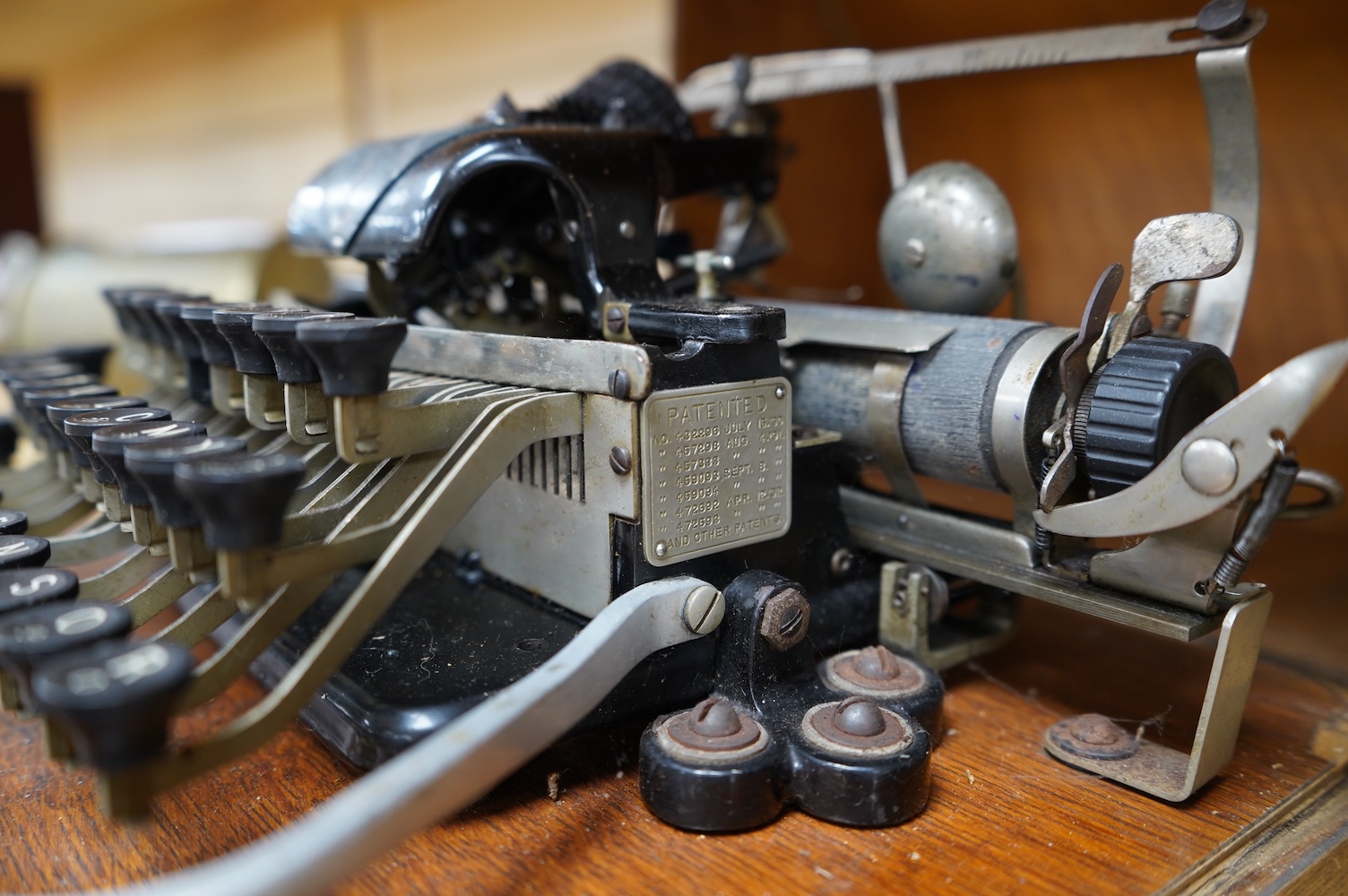 A late 19th century Blickensderfer Newcastle-on-Tyne, manual typewriter, model No.7, in an oak case with oak plywood cover, Made in the USA. Condition - fair to good, the action appears to move smoothly. There are some r